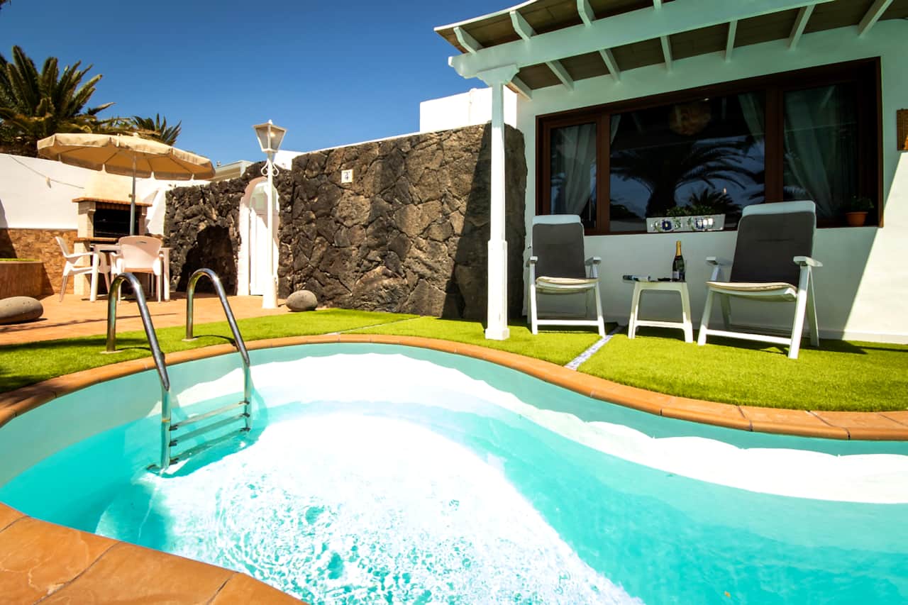 Private pool at Villa Dyala with sunbathing area in Puerto del Carmen, Lanzarote
