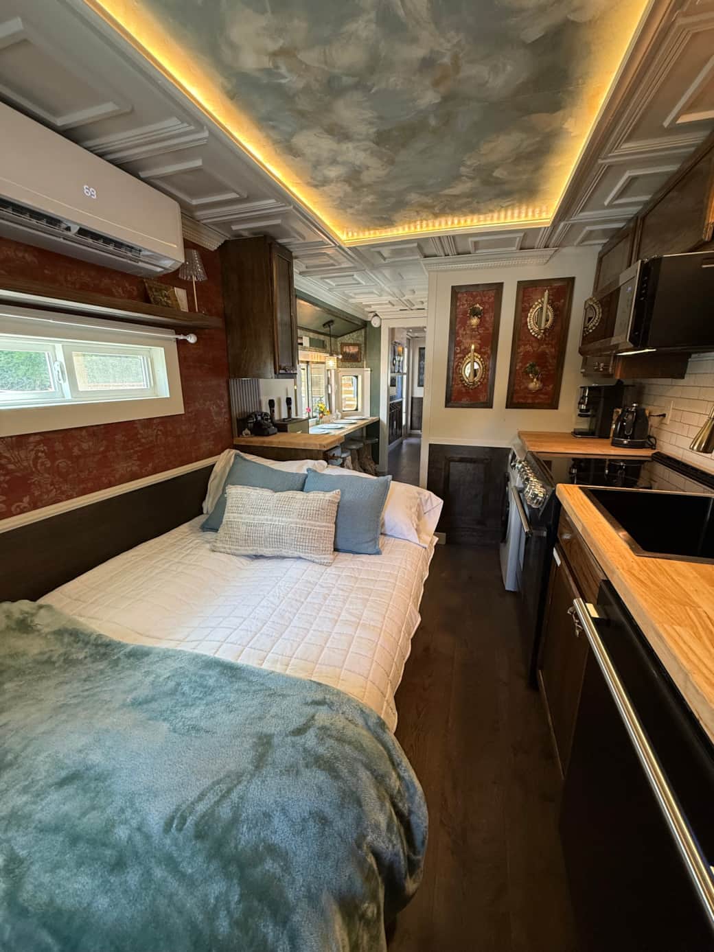 Sofa that converts to a full size RV bed, full size appliances and a washer/dryer