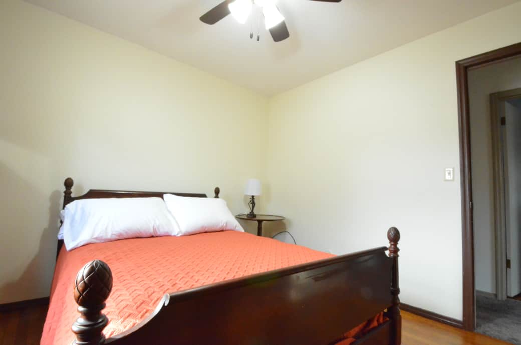 Red Room - Full size bed, storage in the built-in shelves, Roku TV and power for your devices.