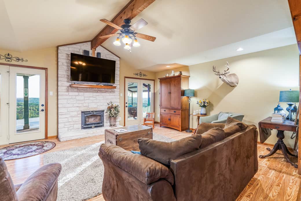 Open Living Area Features Wood-Beamed Ceilings Open Living Area Features Wood-Beamed Ceilings