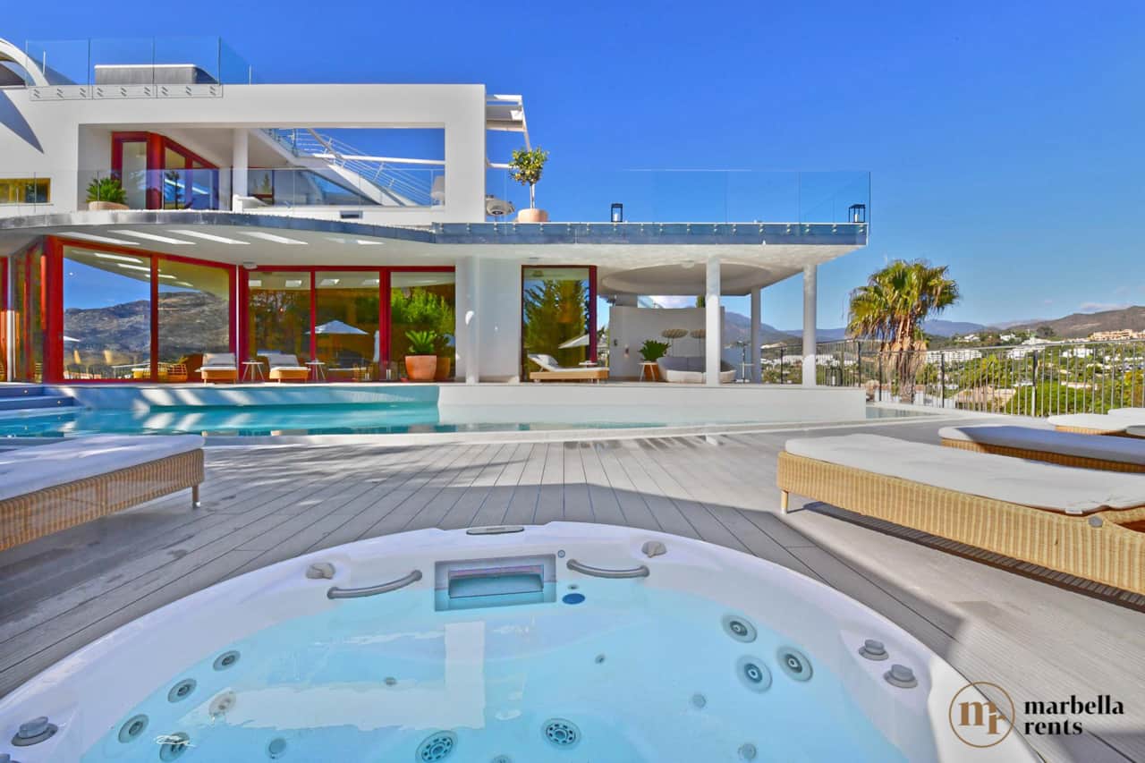 Jacuzzi and sun loungers.