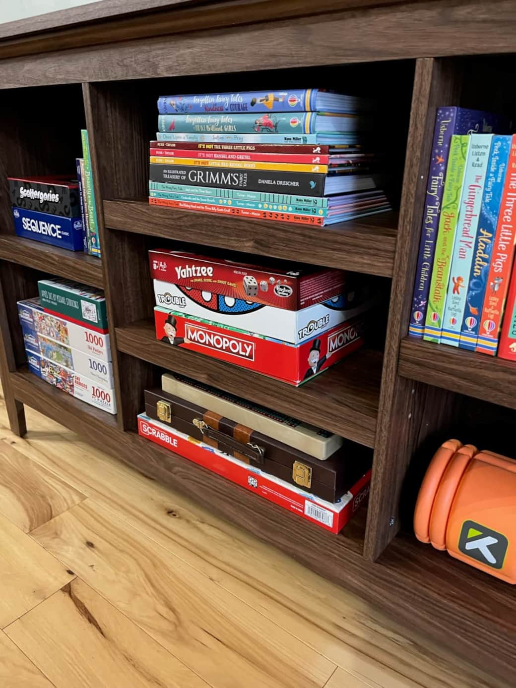 The shelves are stocked with games and puzzles for plenty of family entertainment options.