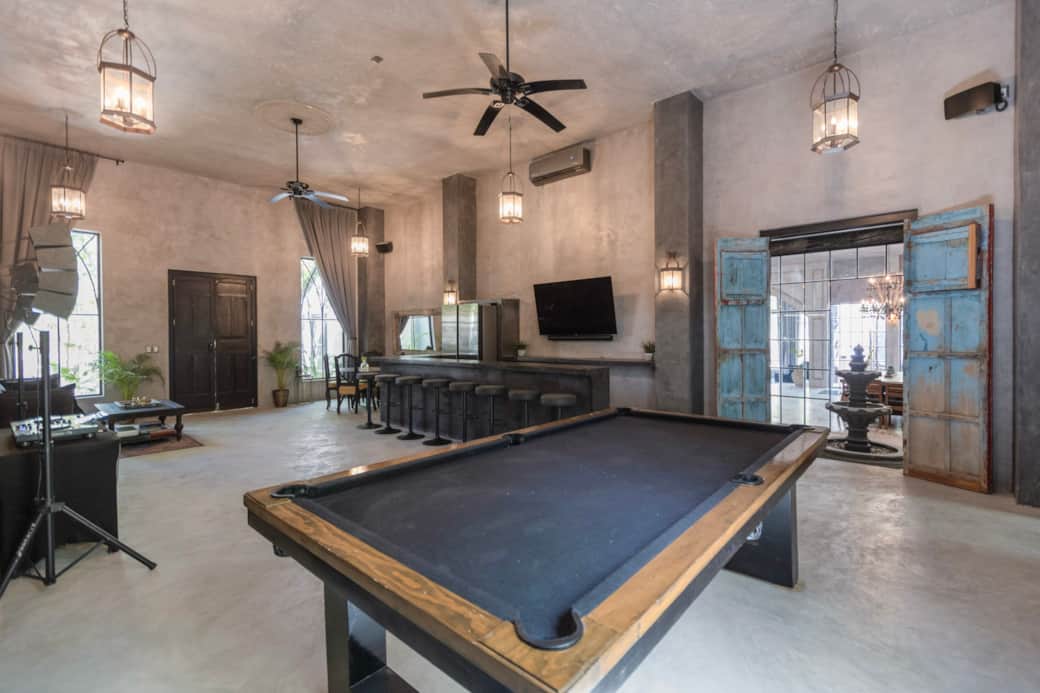 The unique "Dojo" space is equipped with a full-sized bar, billiards, and Sonos