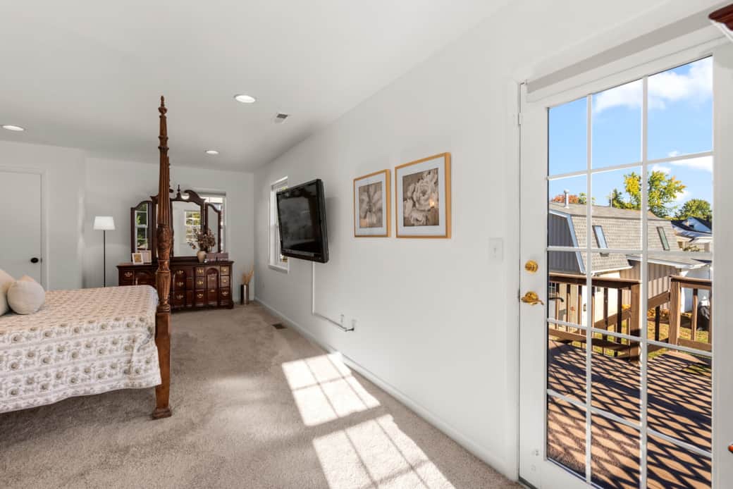 Primary bedroom with lots of space and access to balcony 