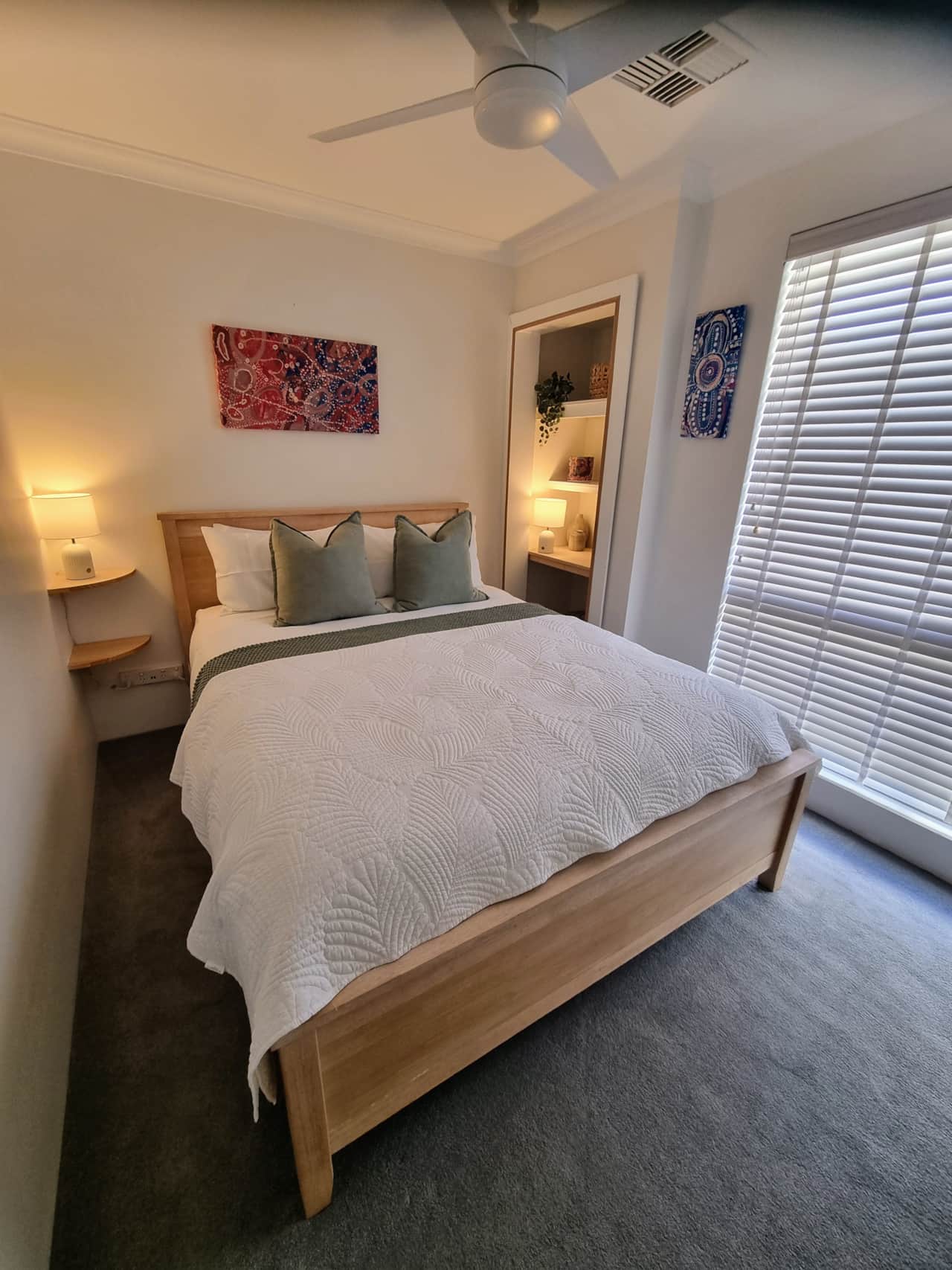 Beautiful Queen bedroom with air-conditioning/ heating and reading lamps. Sockets beside the b
