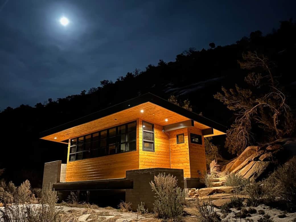 the Shower House nestles up against the cliffs