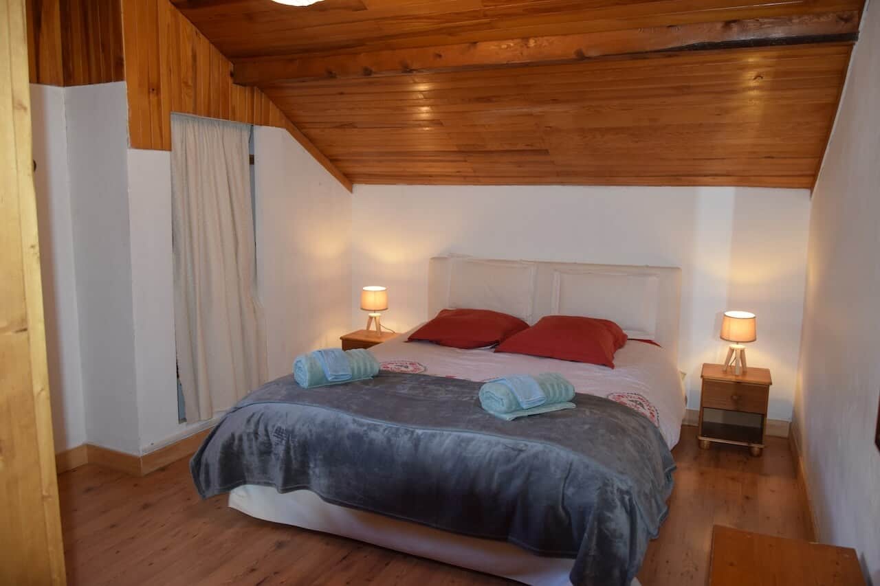 Rochebrune bedroom with queen-size bed and mountain views, Serre Chevalier Valley