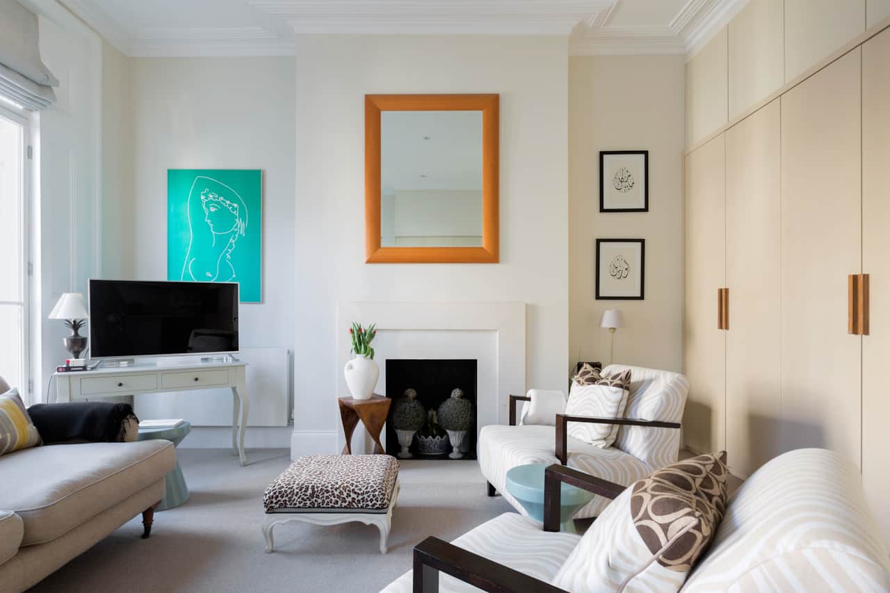 Elegant living room with fireplace, Earls Court Chelsea flat