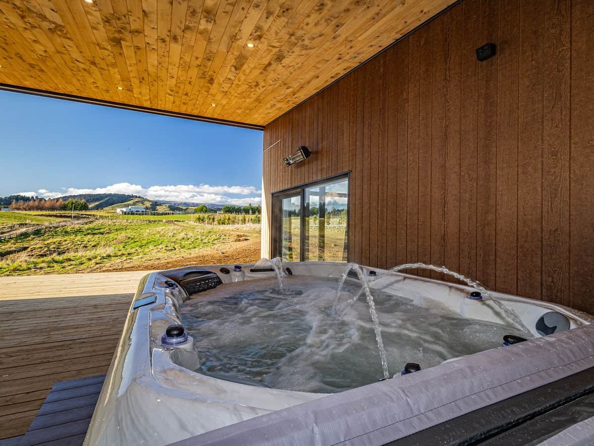 Soak in the hot tub with a view of Ruapehu