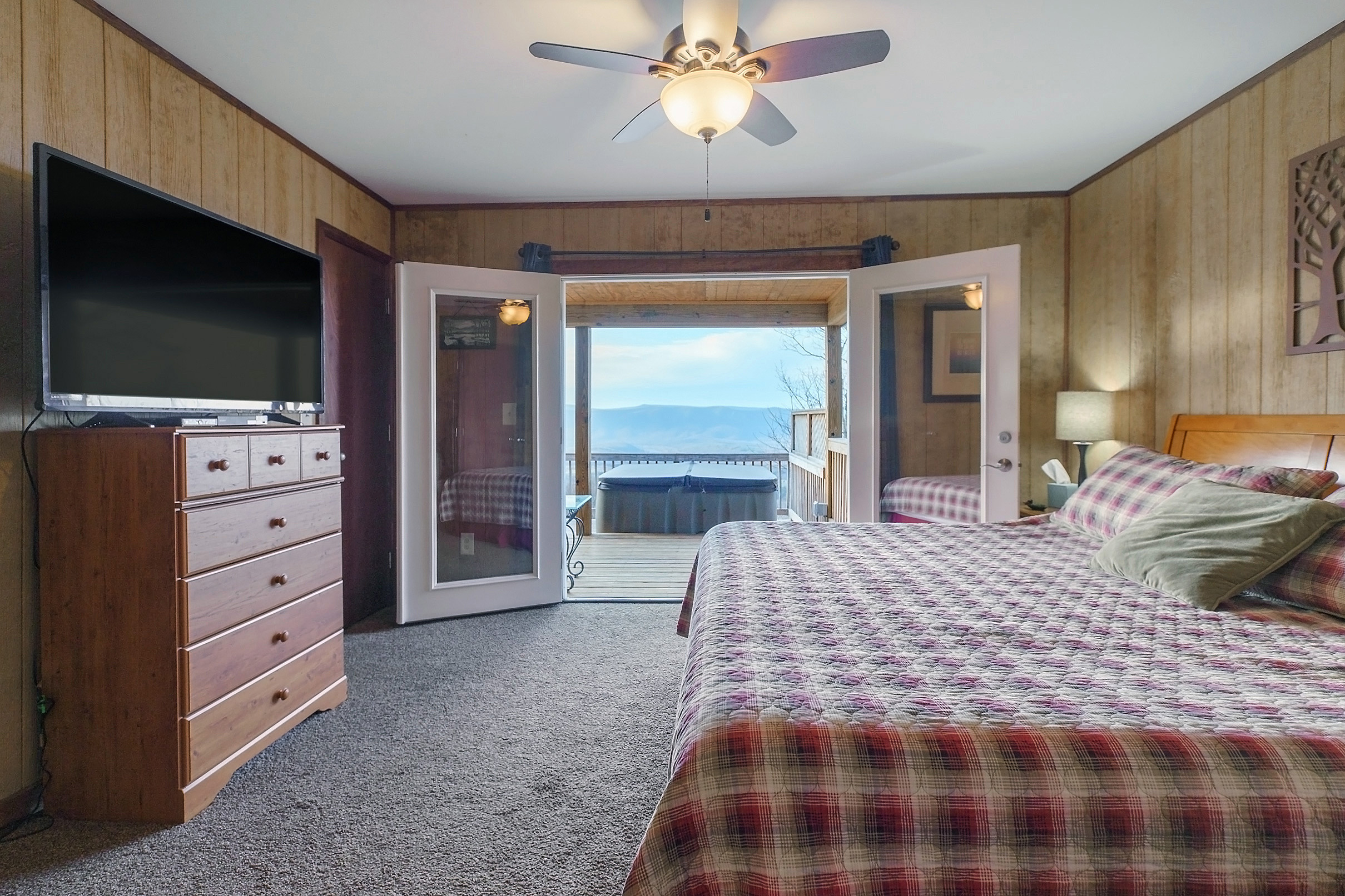 Master Bedroom opens to deck and hot tub
