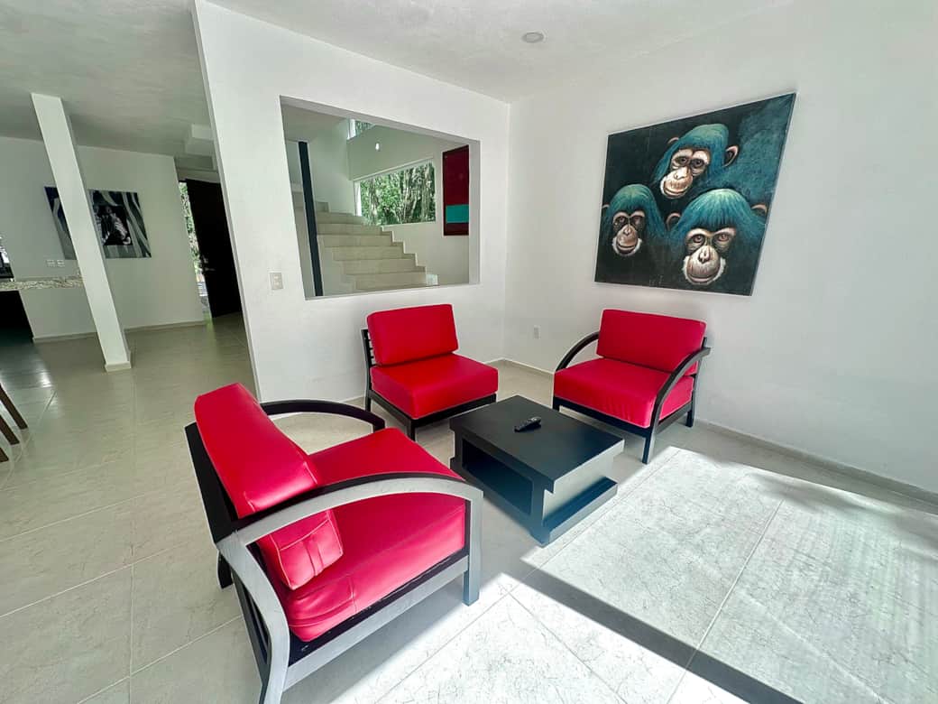 Open living space: living room, kitchen, dining area and patio 