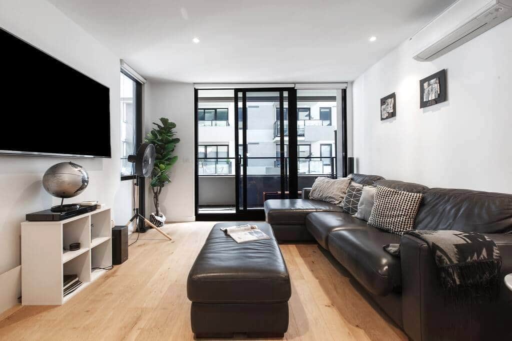 Real leather couch set and large smart TV Real leather couch set and large smart TV