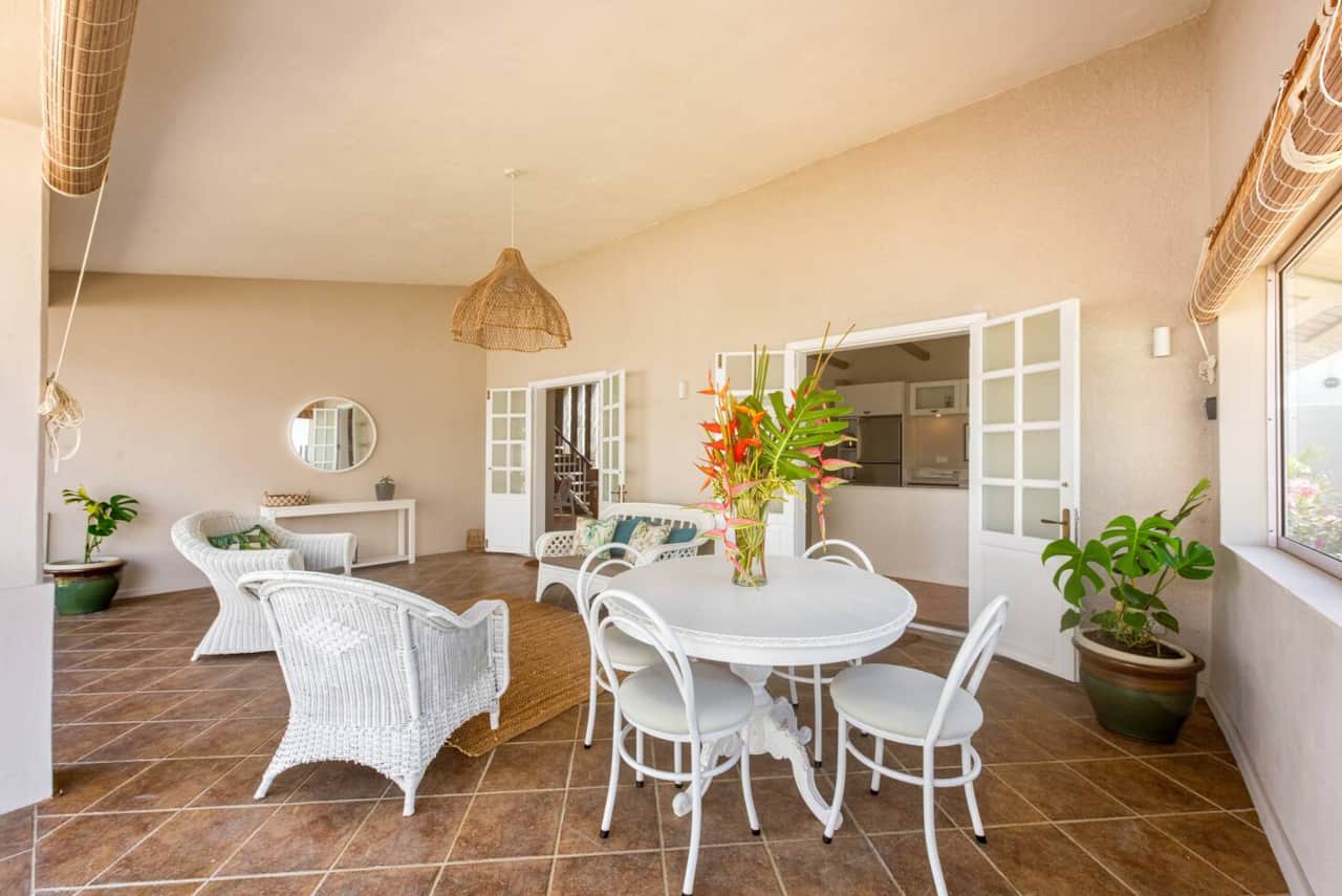 Spacious terrace featuring a dining area seating 4 people and comfortable lounge space