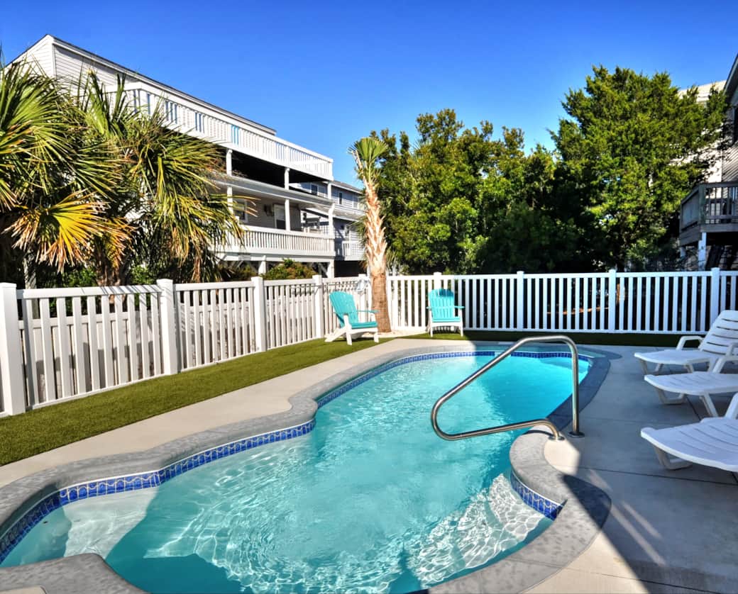 Turf surrounds the pool. Your feet will thank us.