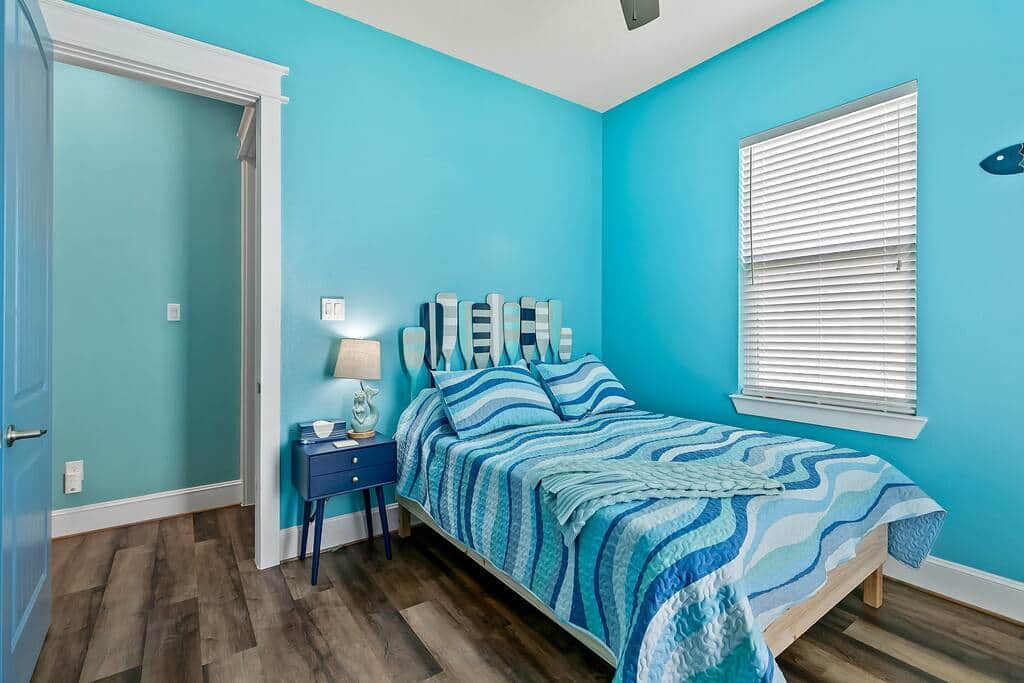 Bedroom 3 with Queen bed and rear Balcony access