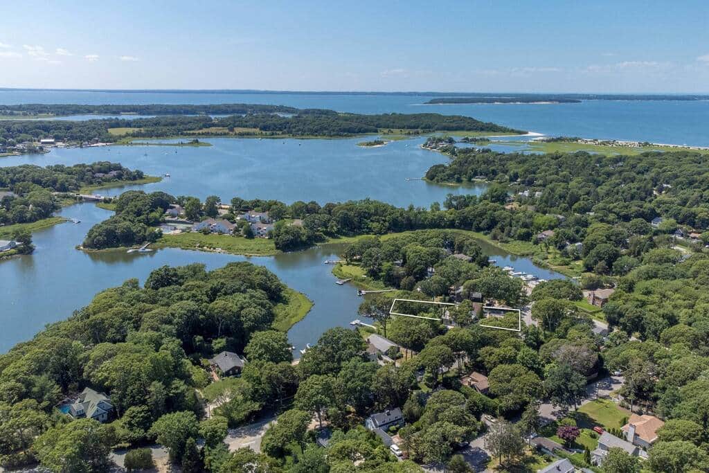 Aerial view of Fish Cove opening into North Sea Harbor and Peconic Bay, with the house outlined