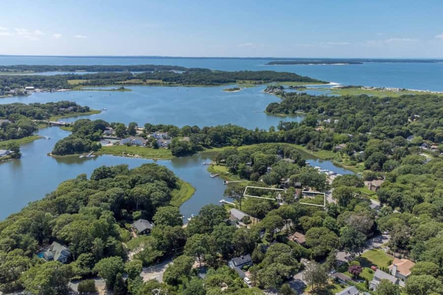 Aerial view of the house, outlined, on Fish Cove with North Sea Harbor beyond
