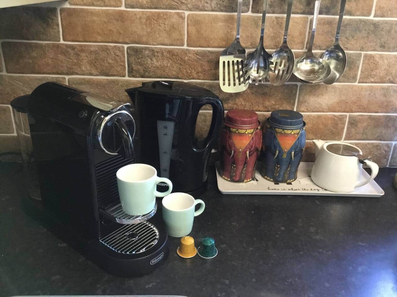 Nespresso coffee machine with complimentary pods.