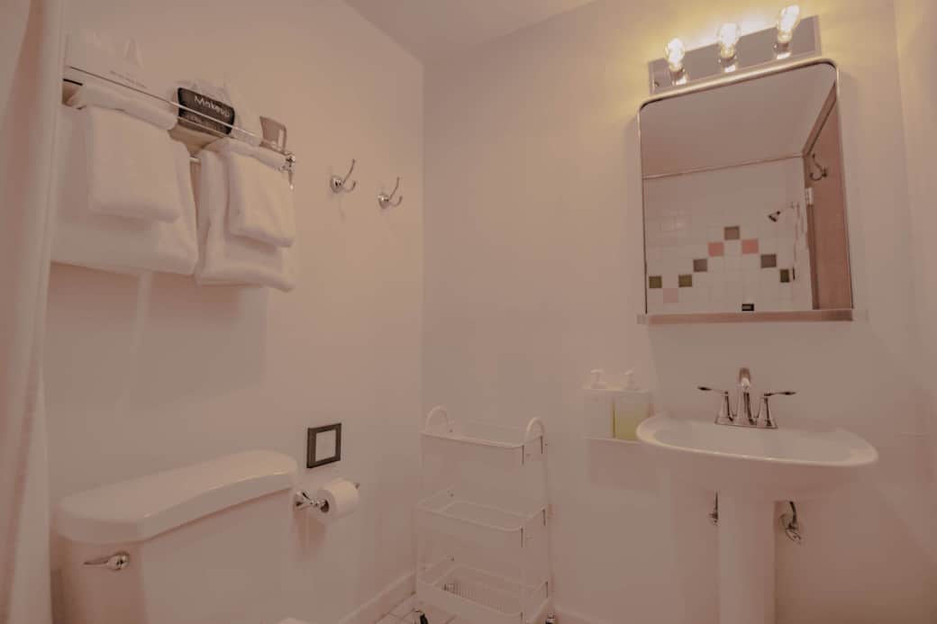 Private bathroom with updated fixtures.