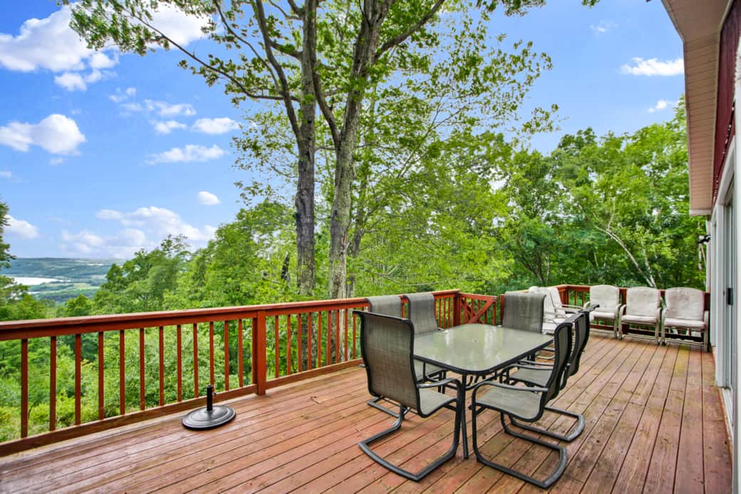 Deck seating at Villa with a View Ives Run in the background. 