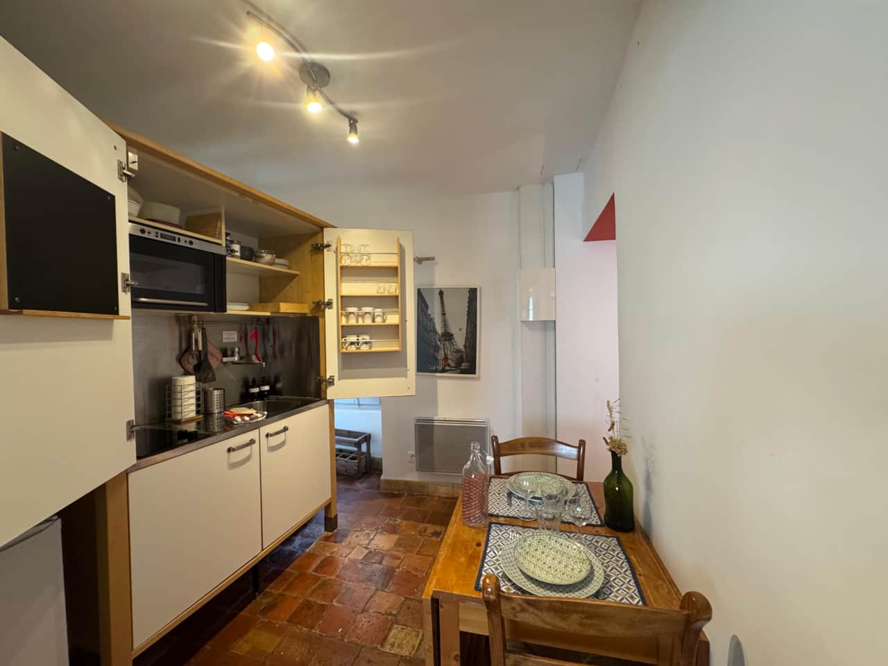 kitchen, microwave, dining table, chairs