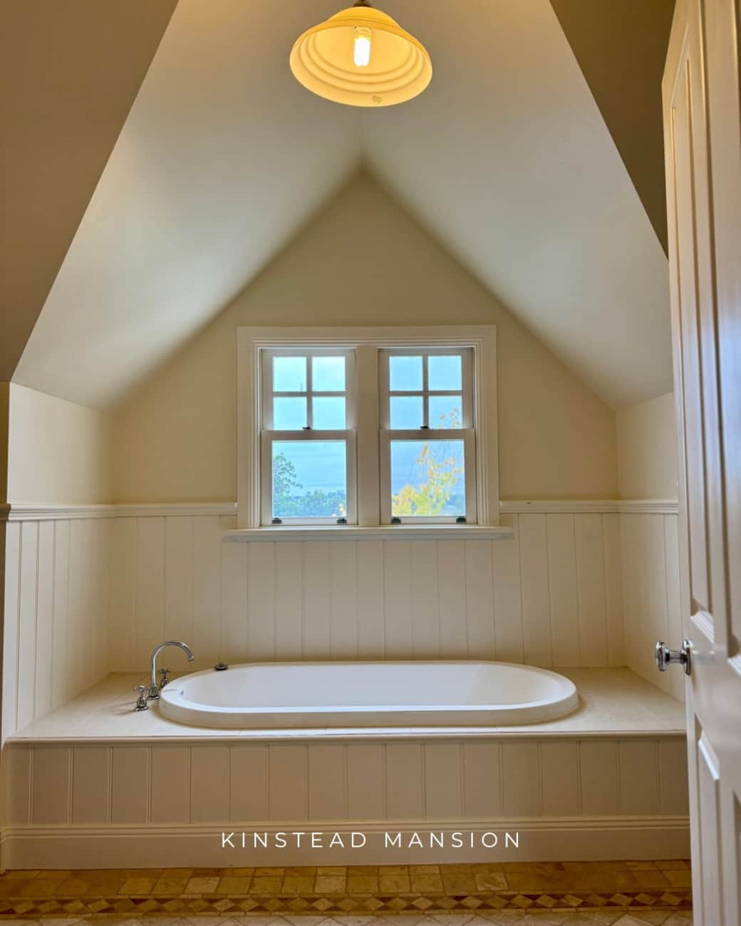 Bathtub with attached shower