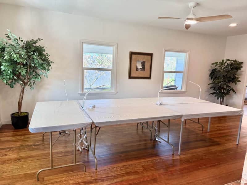 Main craft area — long tables with task lighting