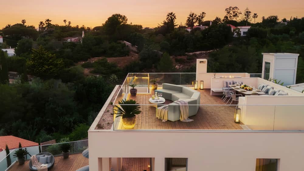 Aerial view of the rooftop terrace of Villa Medusa Paraiso at sunset