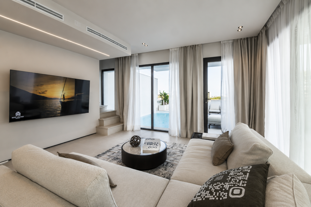 AZULIS Athos villa RENTAL12 Golfo Aranci living room pool terrace view