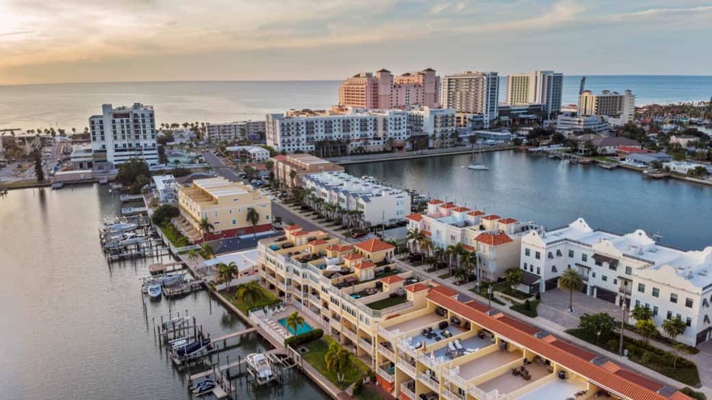 Aerial view of the home shows its location on the intracoastal and close proximity to the beach