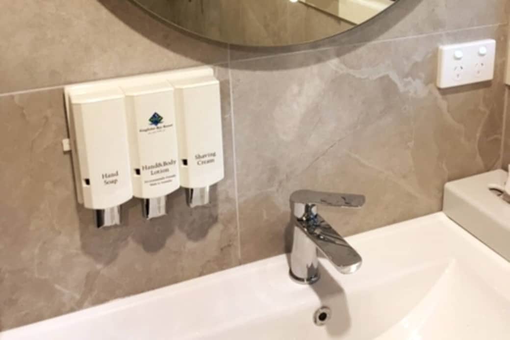 Luxurious bathroom complete with supply of soap, shaving cream, lotion, shampoo, shower gel, conditioner 