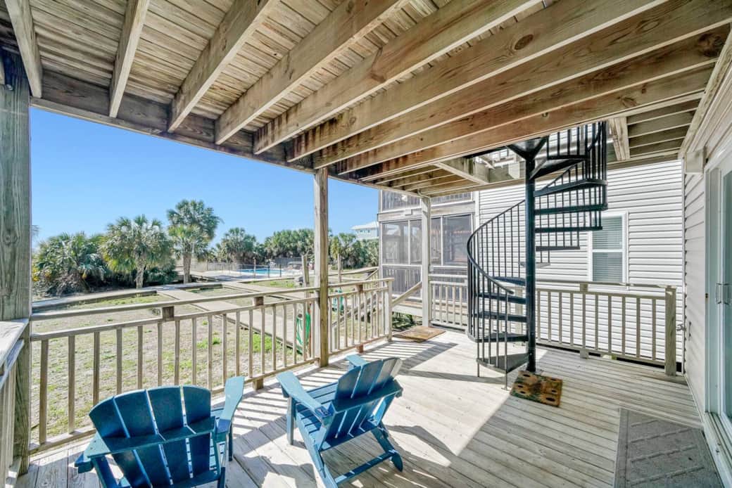 Enjoy a morning cup of coffee listing to the soothing sounds of the gulf off of the downstairs king bedroom. Enjoy a morning cup of coffee listing to the soothing sounds of the gulf off of the downstairs king bedroom.