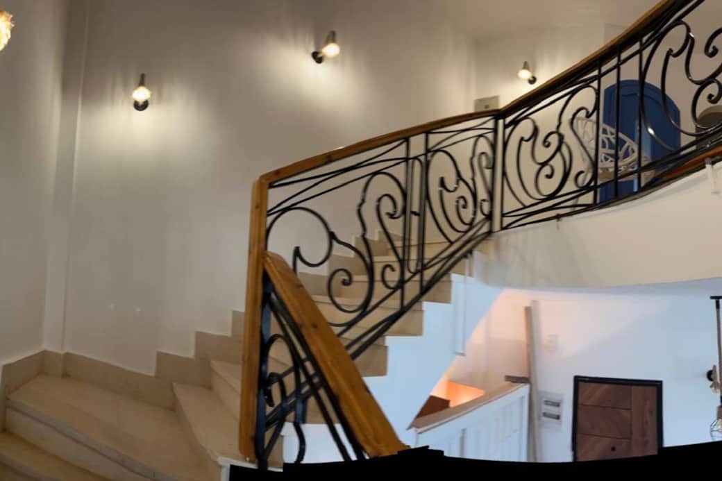 staircase going up to the seconf floor where 3 bedrooms and 2 bathrooms located 