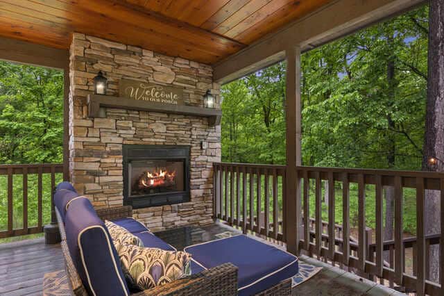 You'll love the way this cabin pulls the outdoors in! Relax around the fireplace on the deck