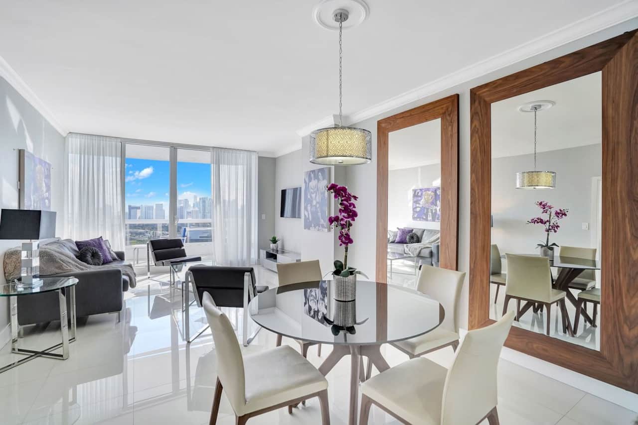 Dining area, living room, Tv, balcony access 