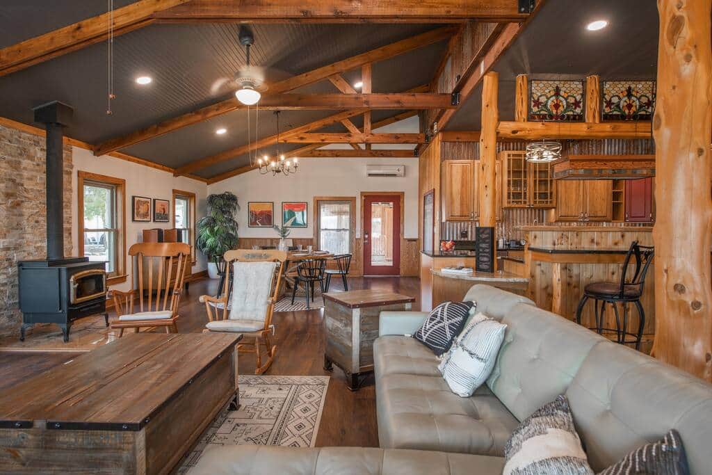 Open floorplan with a mix of modern and vintage furniture.