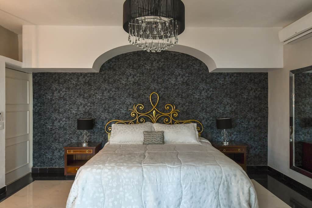 Master bedroom has a king-sized bed for complete and spacious comfort during your stay. Master bedroom has a king-sized bed for complete and spacious comfort during your stay.