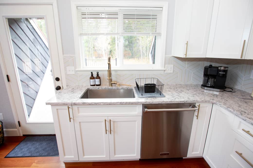 Large, stainless steel chef's sink, Viking dishwasher, Keurig coffee machine with pods and kettle Large, stainless steel chef's sink, Viking dishwasher, Keurig coffee machine with pods and kettle