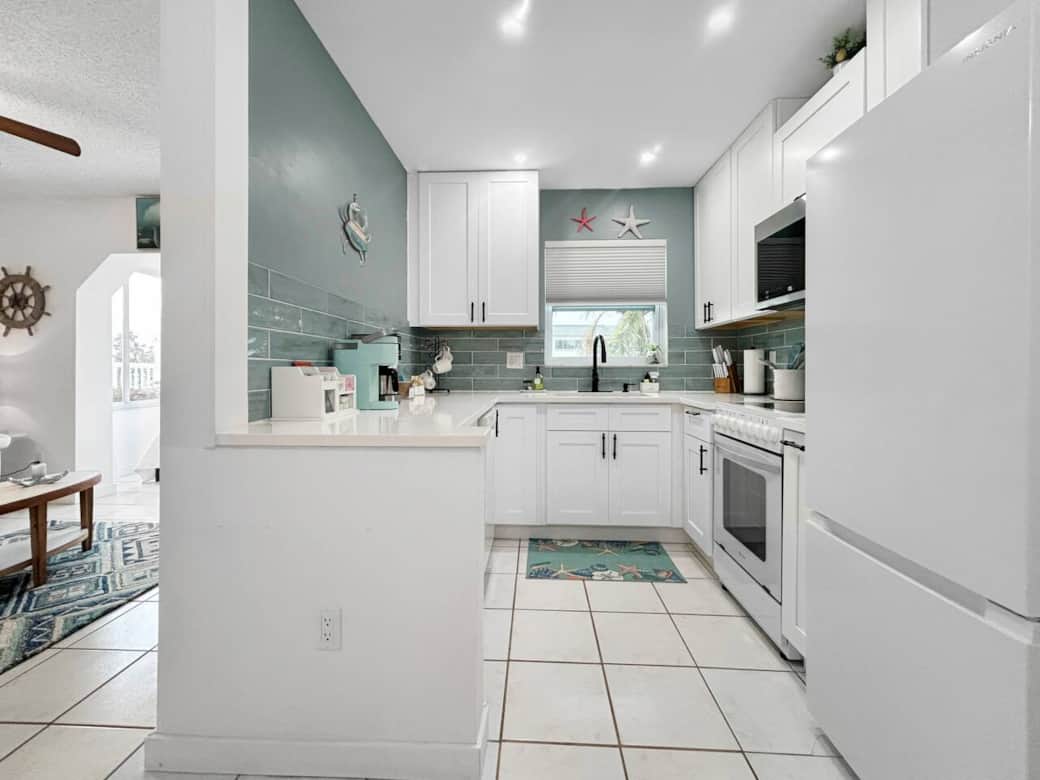 Fully stocked Modern Kitchen with new appliances and dishwasher. Waterfront view. Just bring food and beverages! Fully stocked Modern Kitchen with new appliances and dishwasher. Waterfront view. Just bring food and beverages!