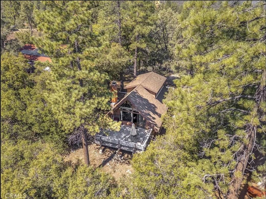 -The back/east-facing deck overlooks a protected greenbelt and is large enough for yoga and dining (at the same time!).
-It also features a propane grill and a dining table that seats six. -The back/east-facing deck overlooks a protected greenbelt and is large enough for yoga and dining (at the same time!).
-It also features a propane grill and a dining table that seats six.