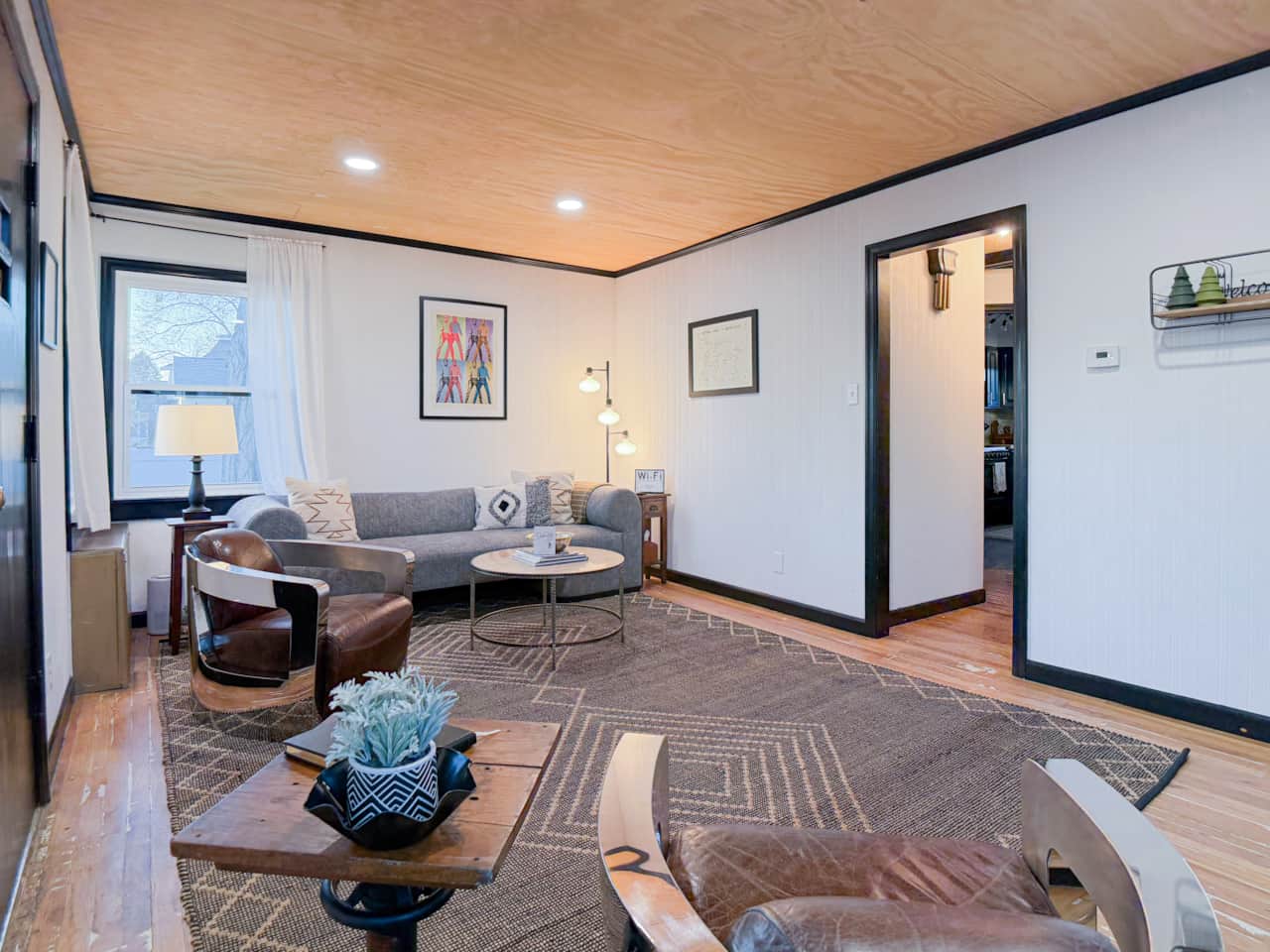 Curated lounge space with leather seating and open flow.