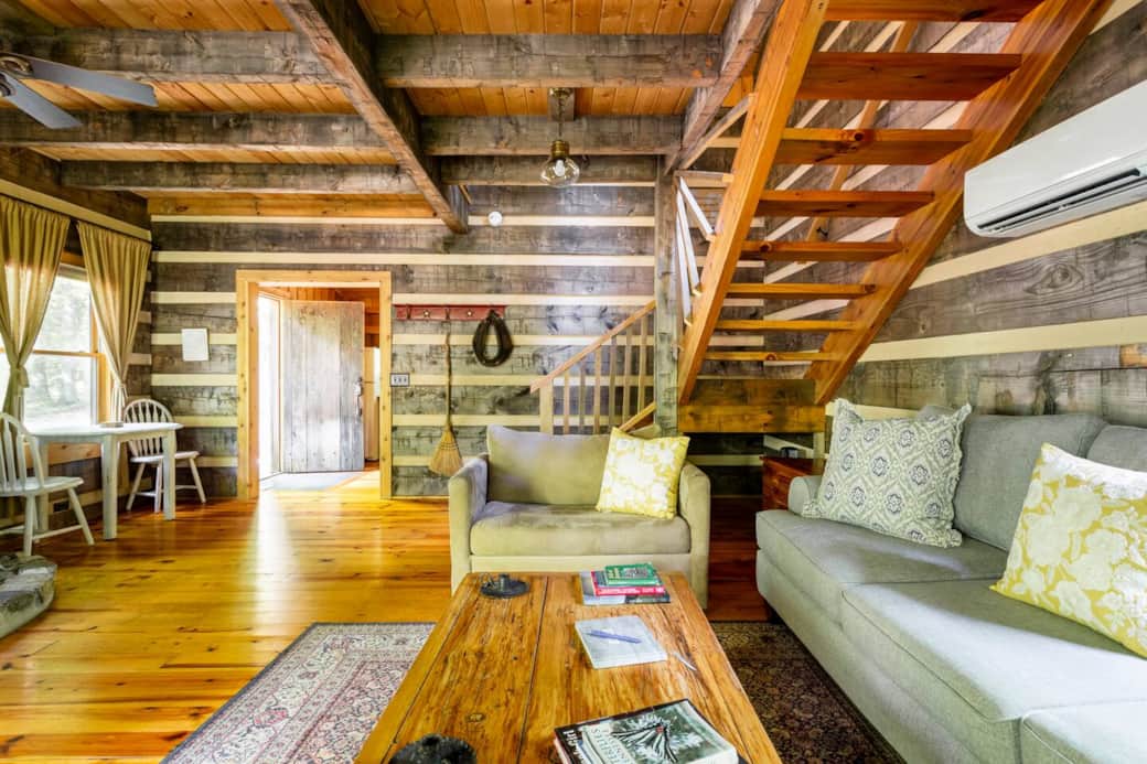 view from living room into kitchen and view of stairs to loft. view from living room into kitchen and view of stairs to loft.