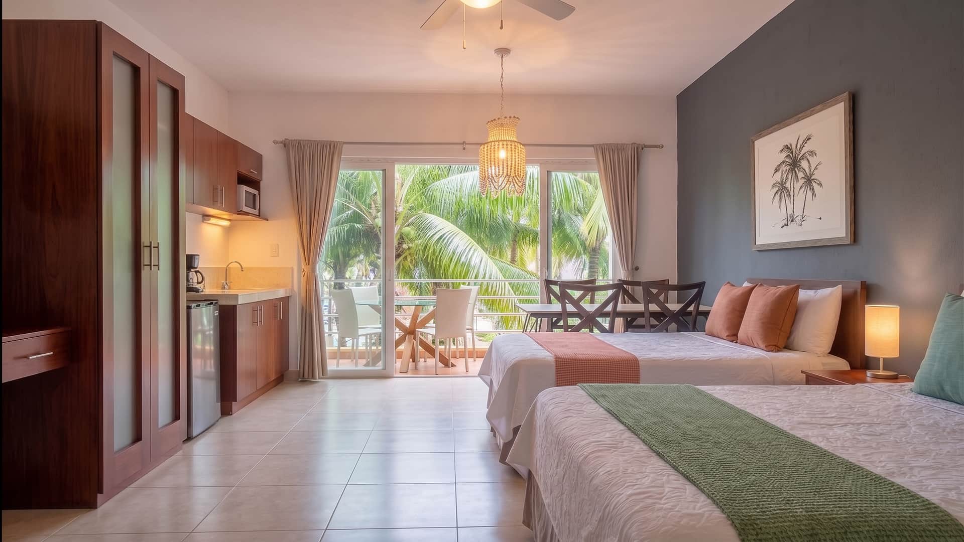 Living Space and Queen Sized Beds with Balcony View.jpg Living Space and Queen Sized Beds with Balcony View.jpg