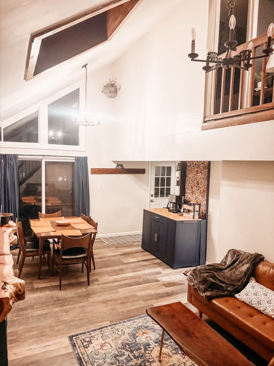 Light-filled dining area with large windows and seating for six (extra chair upstairs). Light-filled dining area with large windows and seating for six (extra chair upstairs).