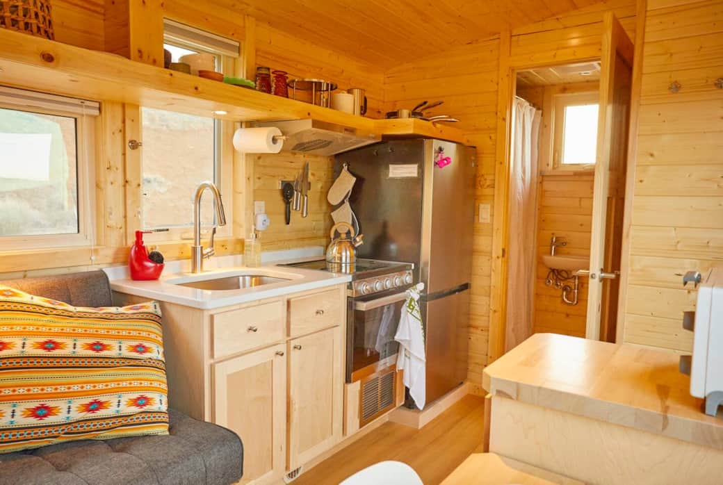 There is a full kitchen including a stove, oven, sink and full size refrigerator/freezer. Everything you may need to make a full meal. There is a full kitchen including a stove, oven, sink and full size refrigerator/freezer. Everything you may need to make a full meal.