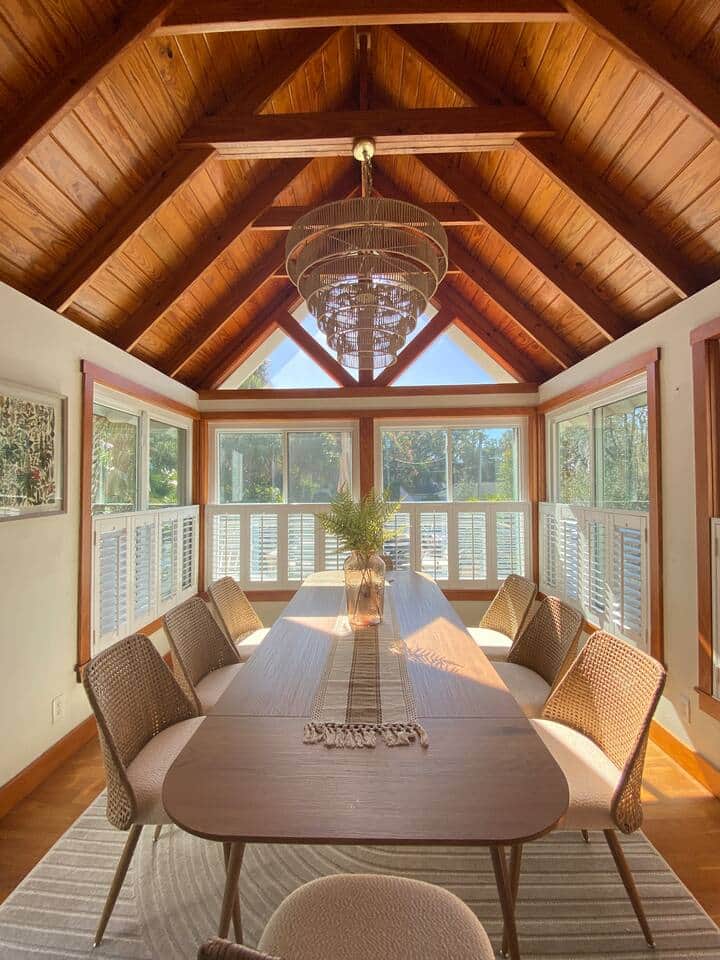 Seating for 8 in the dining room with access to the outside deck with BBQ and more seating.