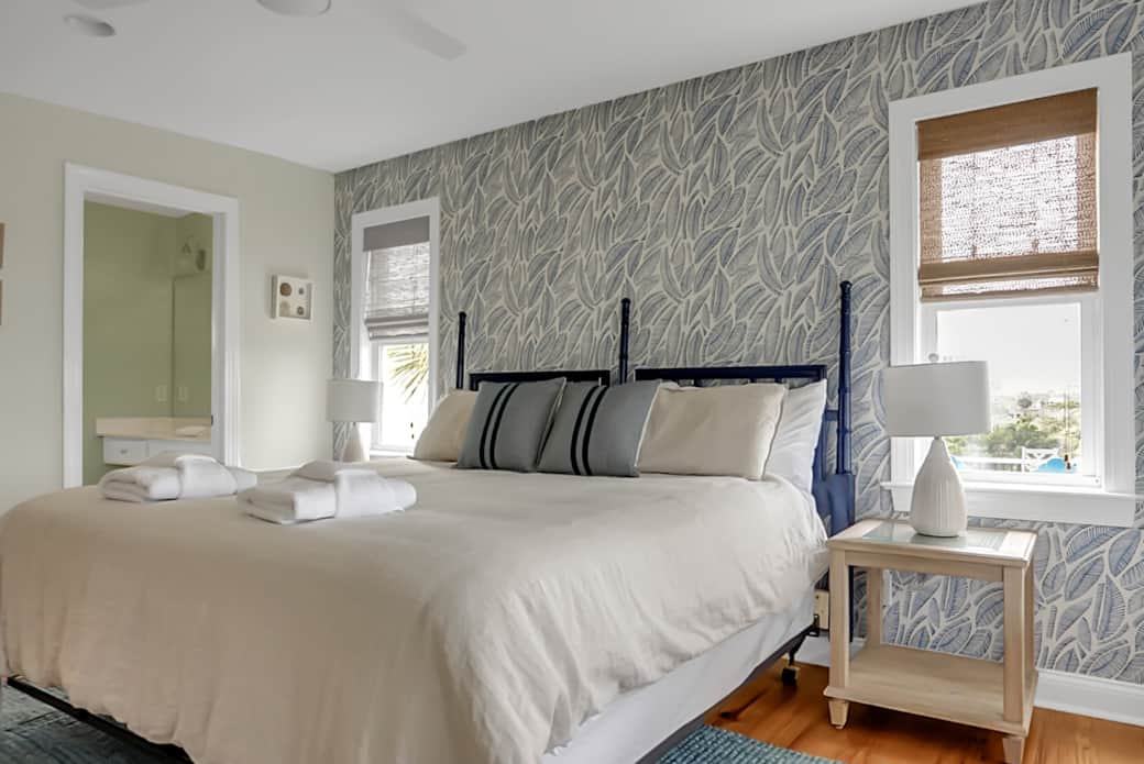 Downstairs Master has a King bed, en suite bathroom and private walkout to screened porch Downstairs Master has a King bed, en suite bathroom and private walkout to screened porch