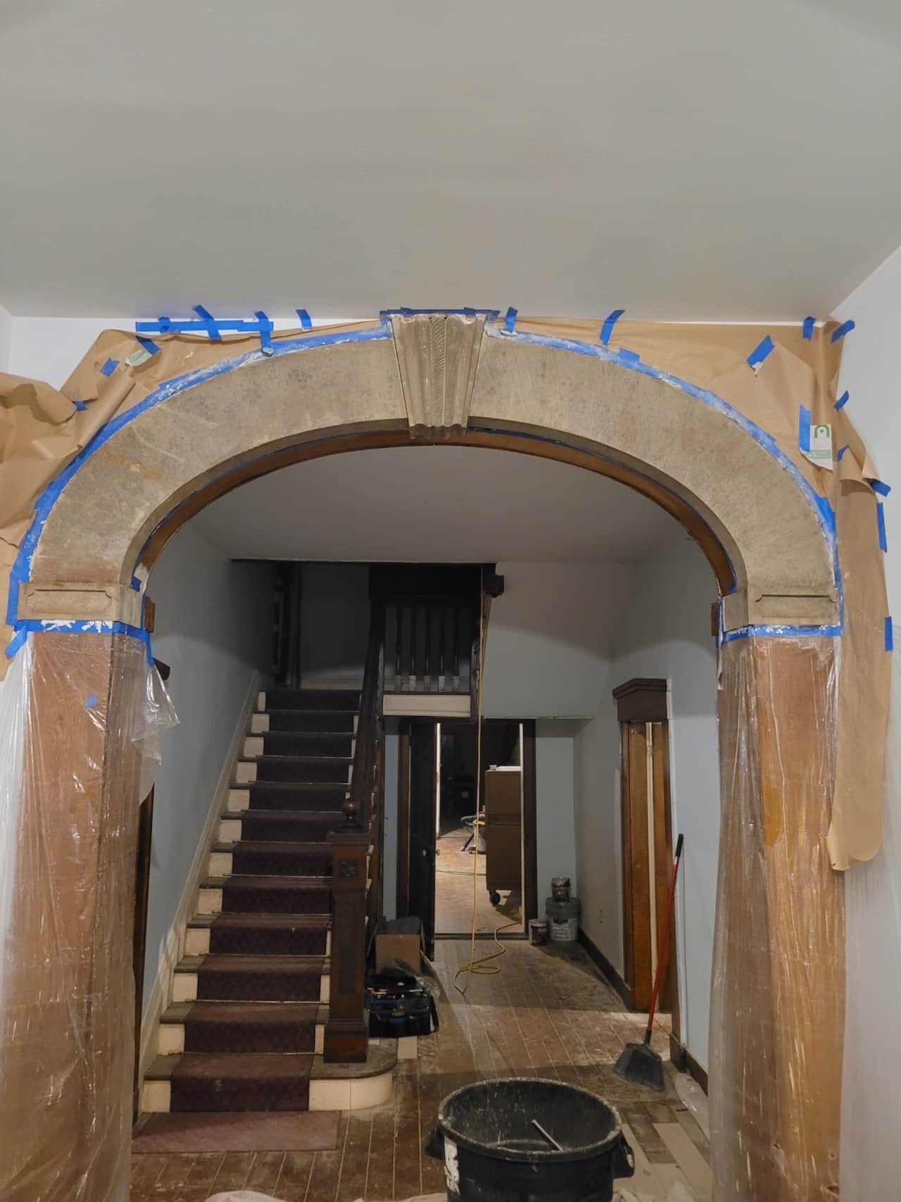 In the process of removing the faux paint off the sandstone arch
