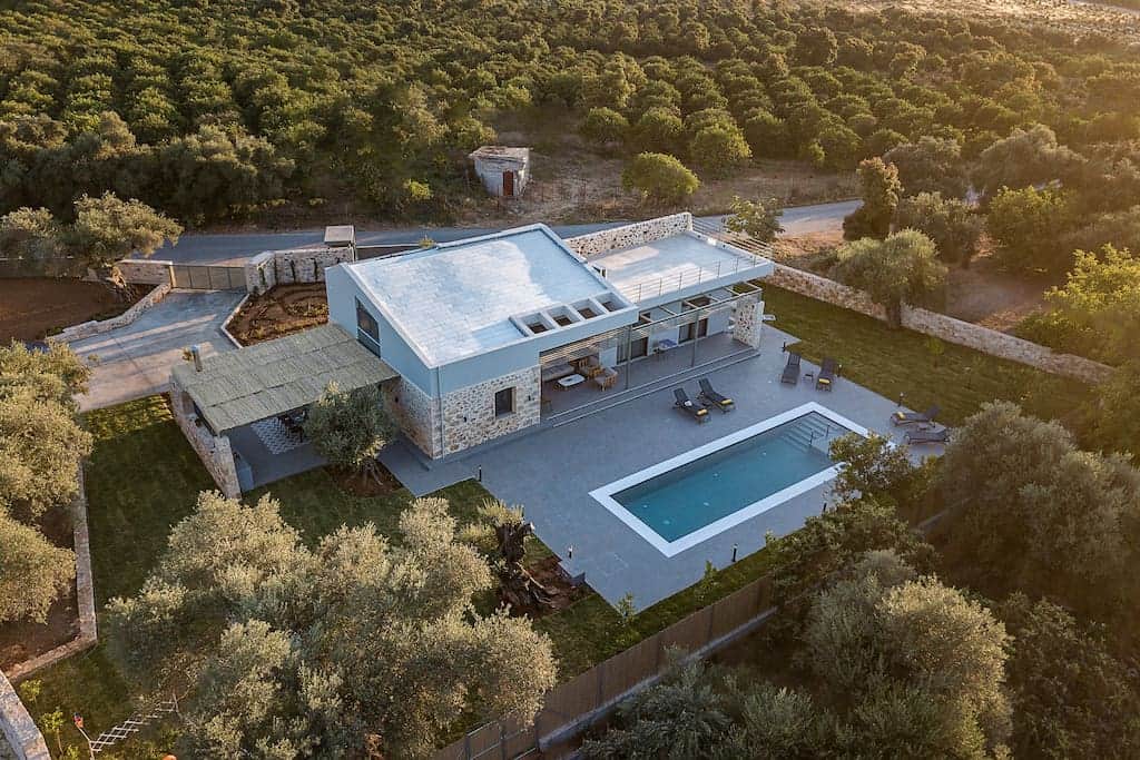 Villa from above, surrounded by the lush area of the valley