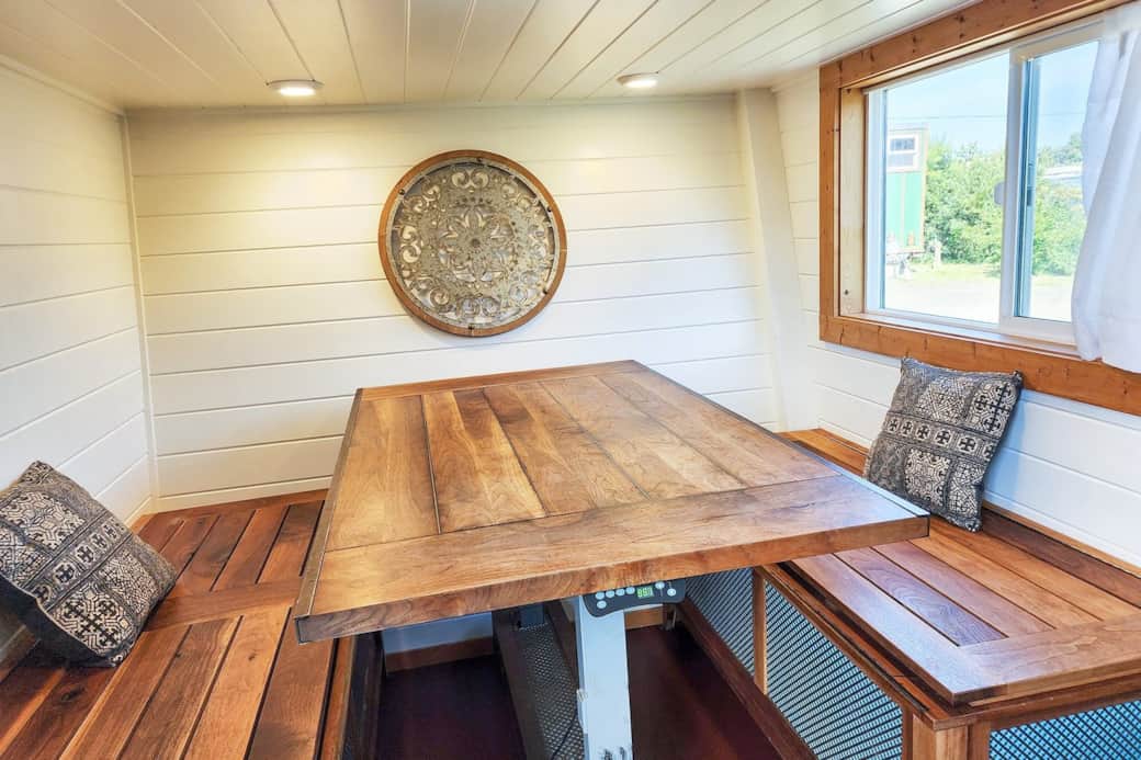 Eating area with table that drops down for fold out mattress